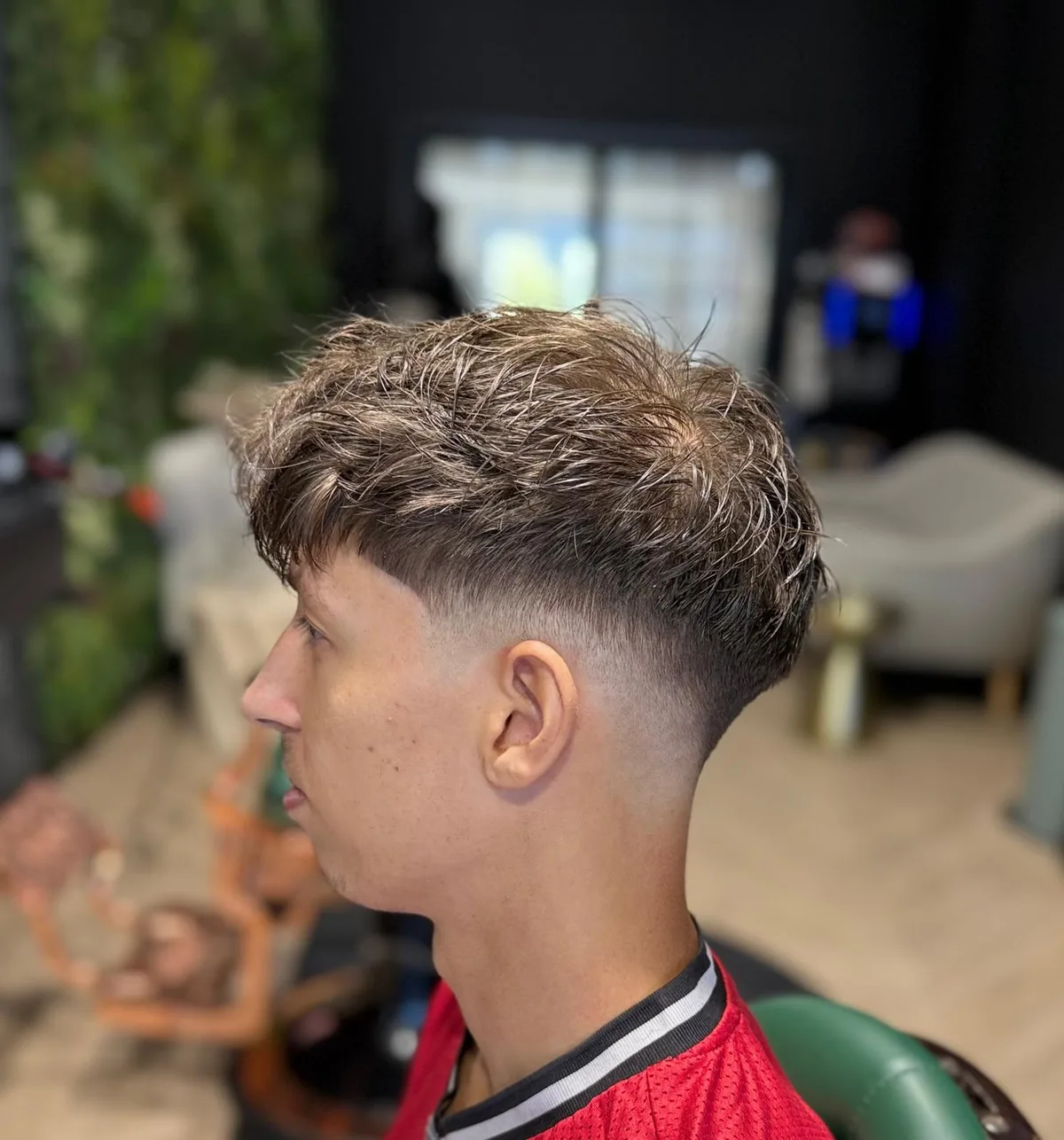 Tevreden klant met verse crop en fade bij FreshAgain Barbers in Hilversum